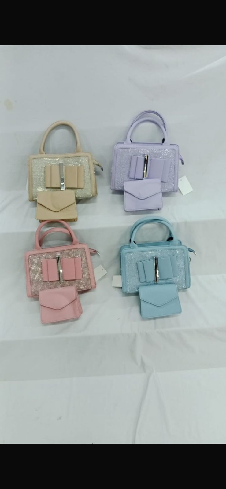 PURE GOSSIP HANDBAGS